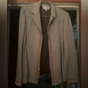 St John Collection adorned with tan leather trim